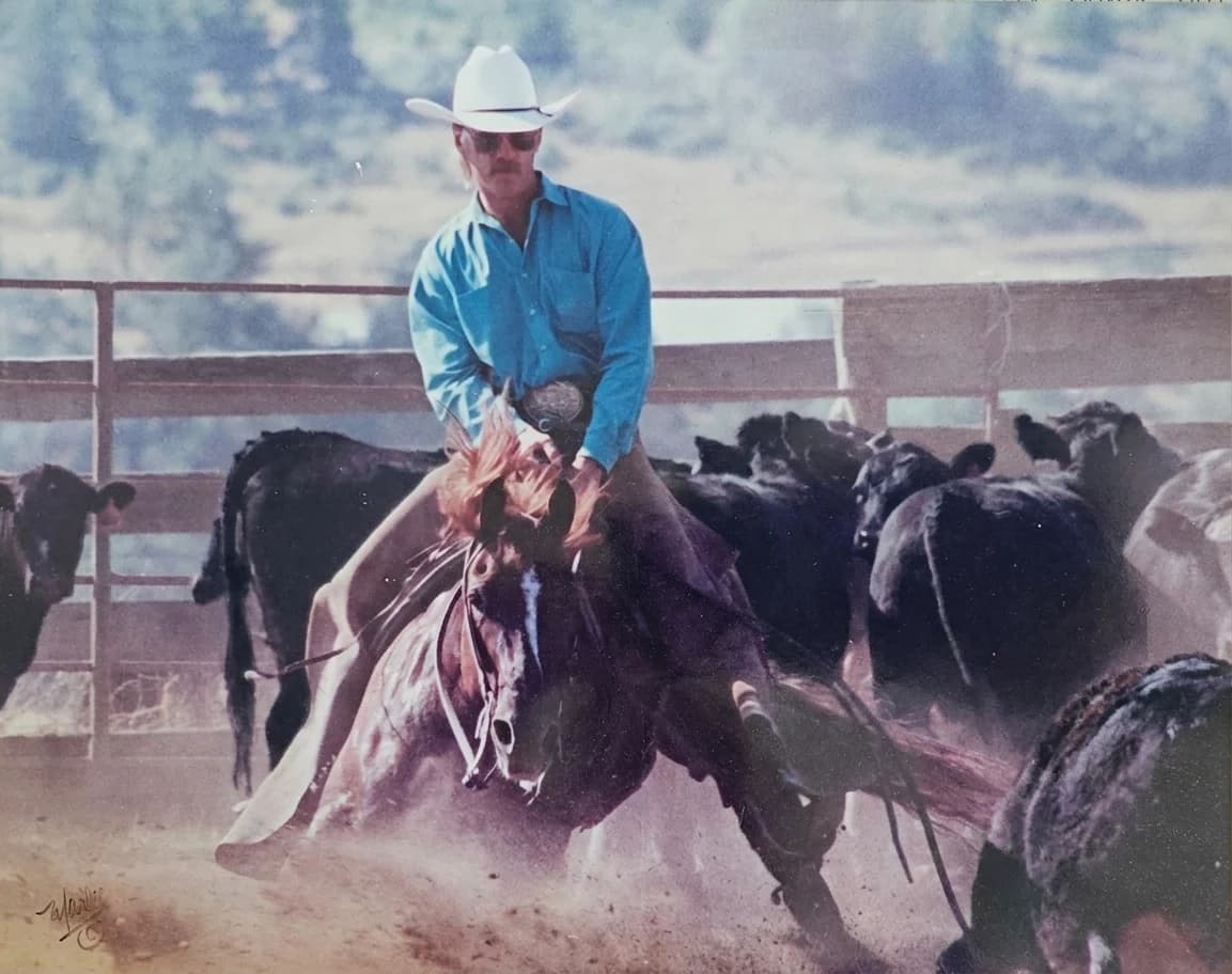 Rancher working cattle at Rogue Land & Cattle